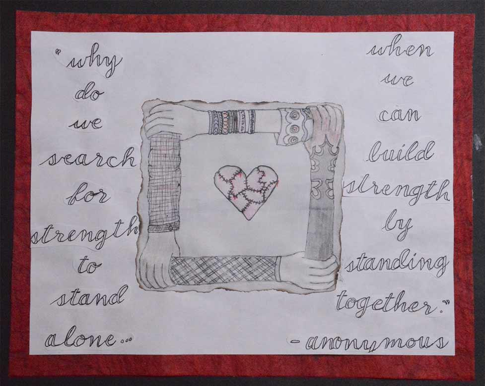 Textile artwork depicts a fence, broken heart, and handwritten message about standing together.