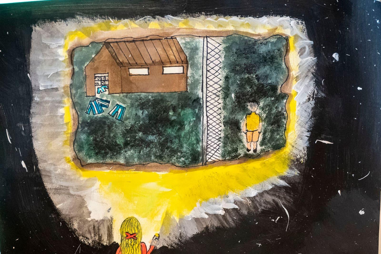 Artwork forms a lightbulb around a camp scene divided by a fence.