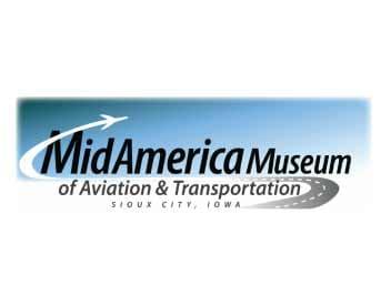 Mid-America Museum logo with black name text, a white airplane, and a gray roadway on a blue gradient panel.